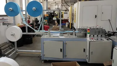 NovaStar, FM104, Semi-Automatic 3-Ply Mask Making Machine, 120 to 150 pcs/min, 175x95mm Mask Size, 10kW