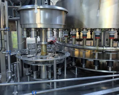 Filmatic Bottle Filling Line, 32 Filling Heads, 8 Capping Heads, 180 BPM