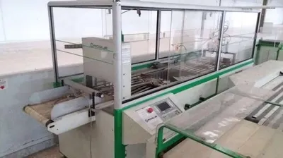 Roq, Roqshirt, 1996, T-Shirt and Polo Shirt Packing Machine, 1200 shirts/hour