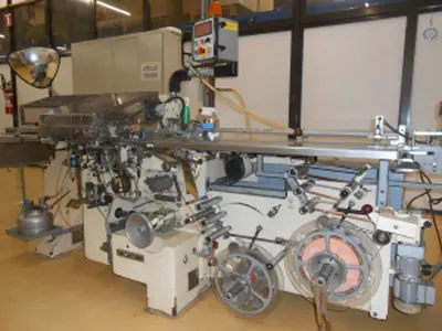 Otto Hansel, Speedy 7216, Chocolate Neapolitan Wrapper, 400 per Minute, with Chocoliner 8214 Aligner/Feeder