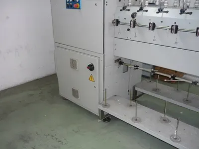 Omm, Bve, 2000, Bobbin Winder, 72 Spindles, 92mm Flange Diameter