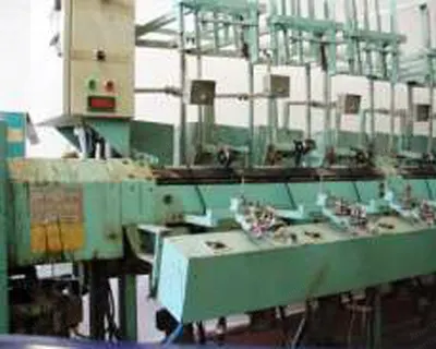 OMP Assembling Winder, 1989, 18 Heads, 8 Cones Feeding Creel, Automatic Doffing