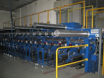 Toniolo, Precision Package Winder, 1998, 22 to 40 Spindles, Spindle Size 75x9cm, For Spandex & Filament Yarns