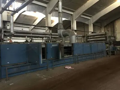 Monforts Stenter, 3200mm Working Width, 2003, 9 Chambers, Oil Heated, with Padder & Mahlo Weft Straightener