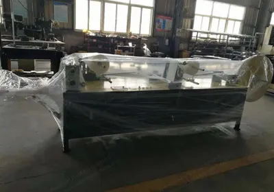 NovaStar, GB135, Gauze Pre-Folding and X-Ray Detectable Thread Attaching Machine, 100-600mm Width, 2-4 Ply, 60-80 m/min