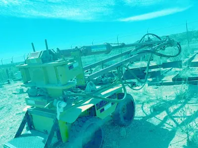 Long Tom, 2-Boom Drill Rigs, Mounted on Skid Steer Carrier, 9ft Retractable Booms