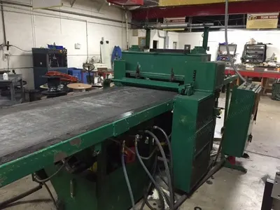 Femco, 60 Ton, 57" Wide Bed, Belt Feed Automatic Die Cutter