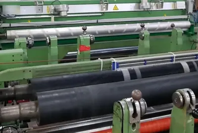 Dusenbery, Slitter Rewinder, 1990, 2600mm Width, 400 m/min, Hot Needle Perforation