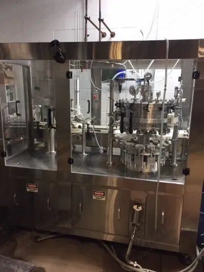Palmer, Mono-Bloc 12/1, 12-Head Rotary Counter Pressure Filling System, Single Head Mechanical Seamer, 16 oz Cans
