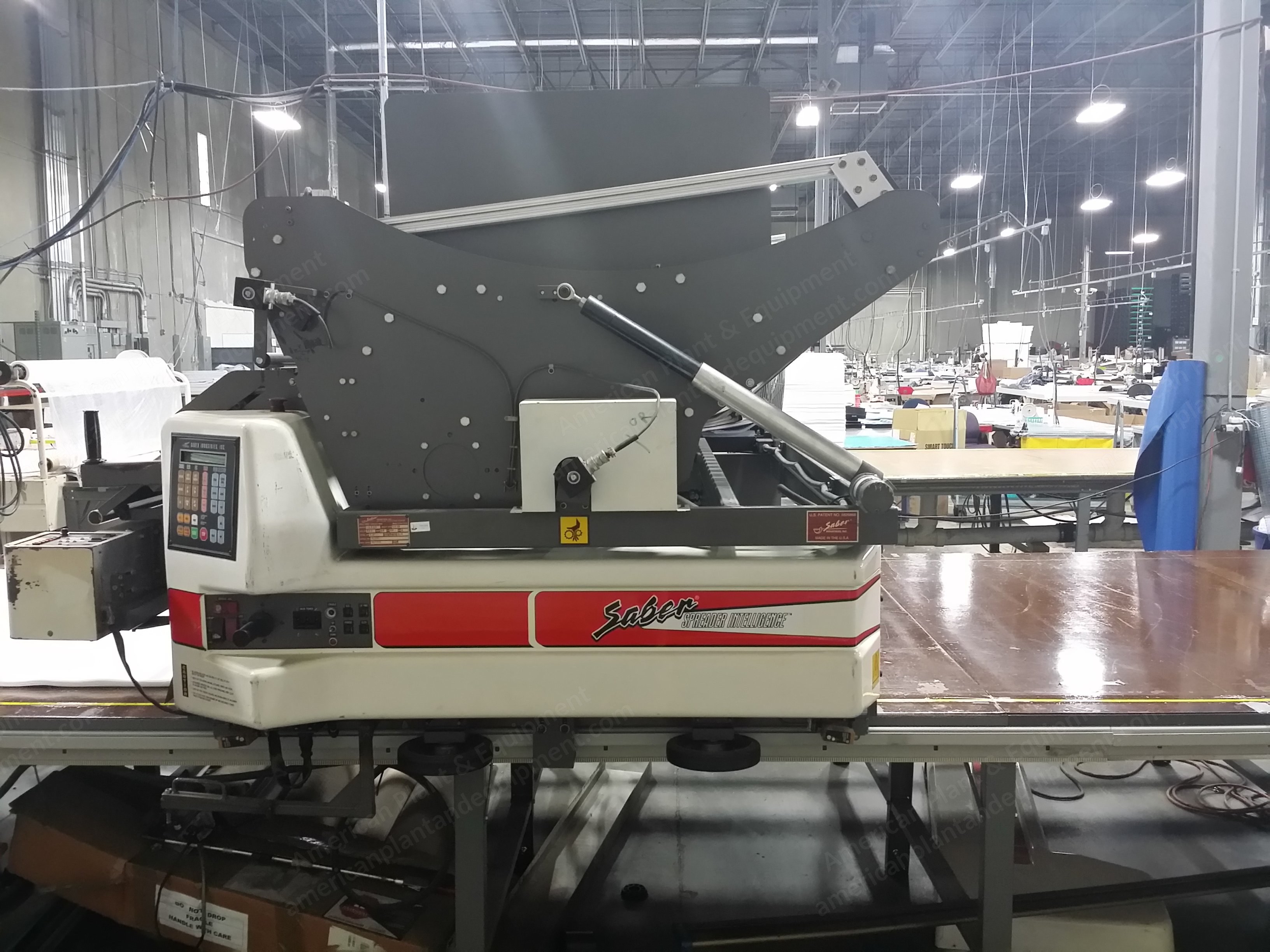 Saber, C1200, Cradle Spreading Machine, 72 Inches, Roll Loading Station