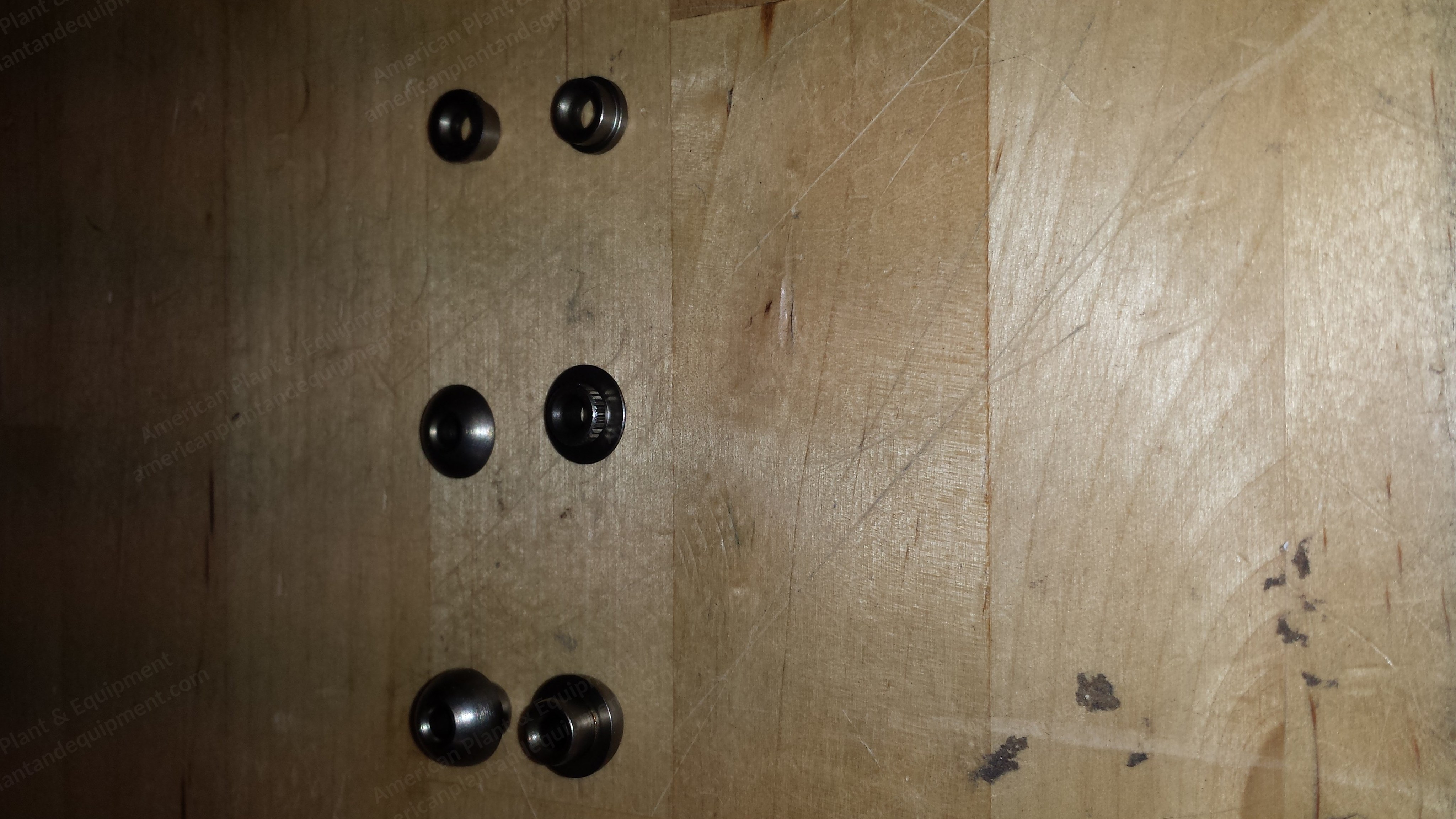 Buttons That Needle Goes Through in Pressure Plate