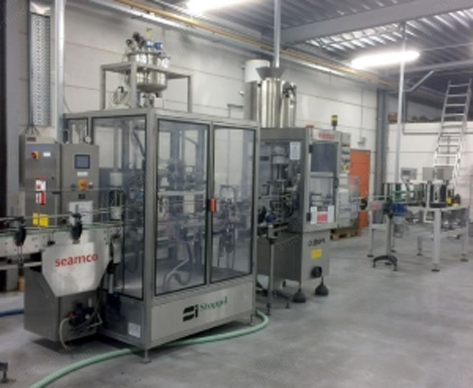 Stoppil, EC20505, Bottle Filling Line, 2 Filling Guns, with Closys Eagle VA Capper and Etilux Labeller