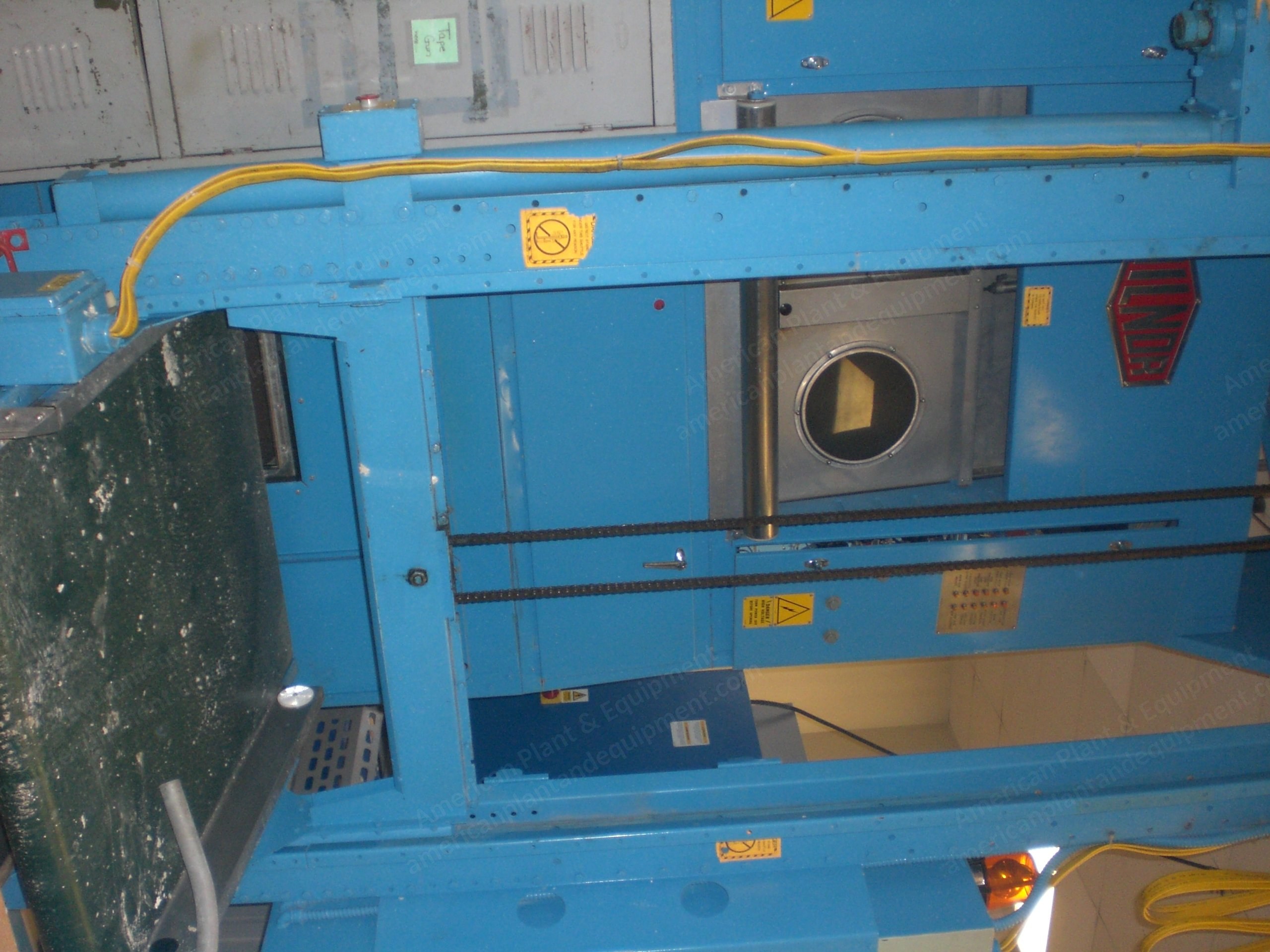 Milnor, Classic CBW, Continuous Batch Washer, with Loading Conveyor, Dryers, Shuttle Conveyor and Press