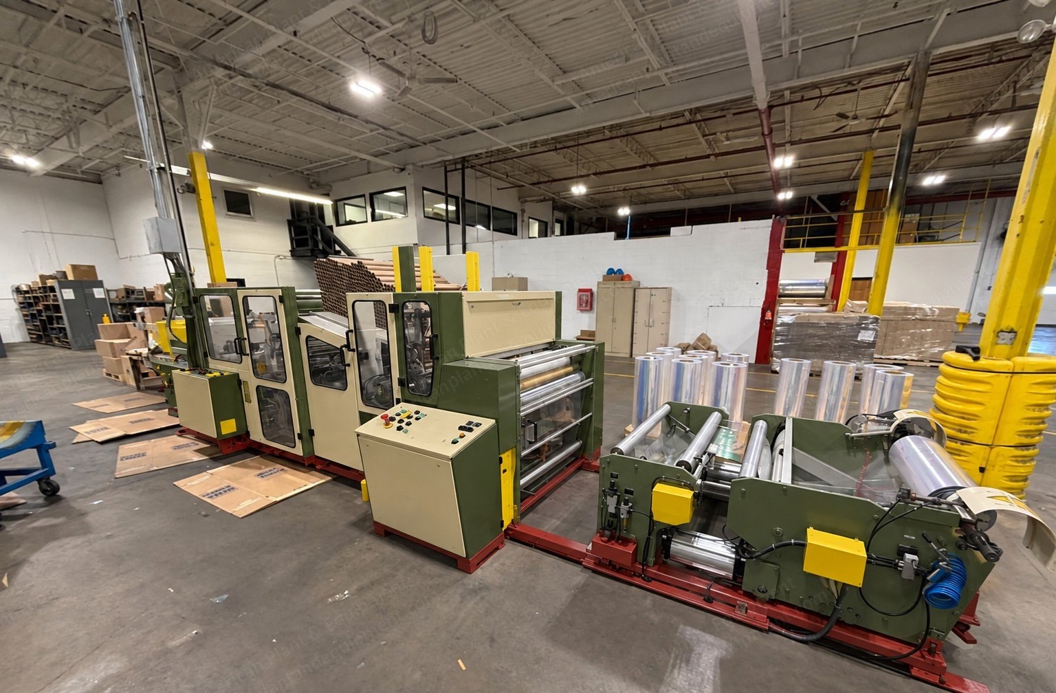 Moller, RW 1000, 1999, 40 Inch Small Roll Rewinder, Core or Coreless, with Overwrapper, Shrink Tunnel and Labeler