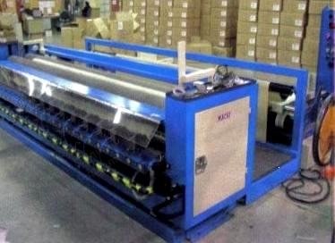 Masci, 130 Inch Wide Goods Fabric Slitter, 30 Inch Roll Capacity, Hot and Cold Cutting