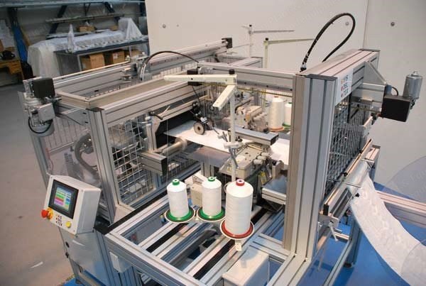 NovaStar, Border Fabric Handle Inserting Machine