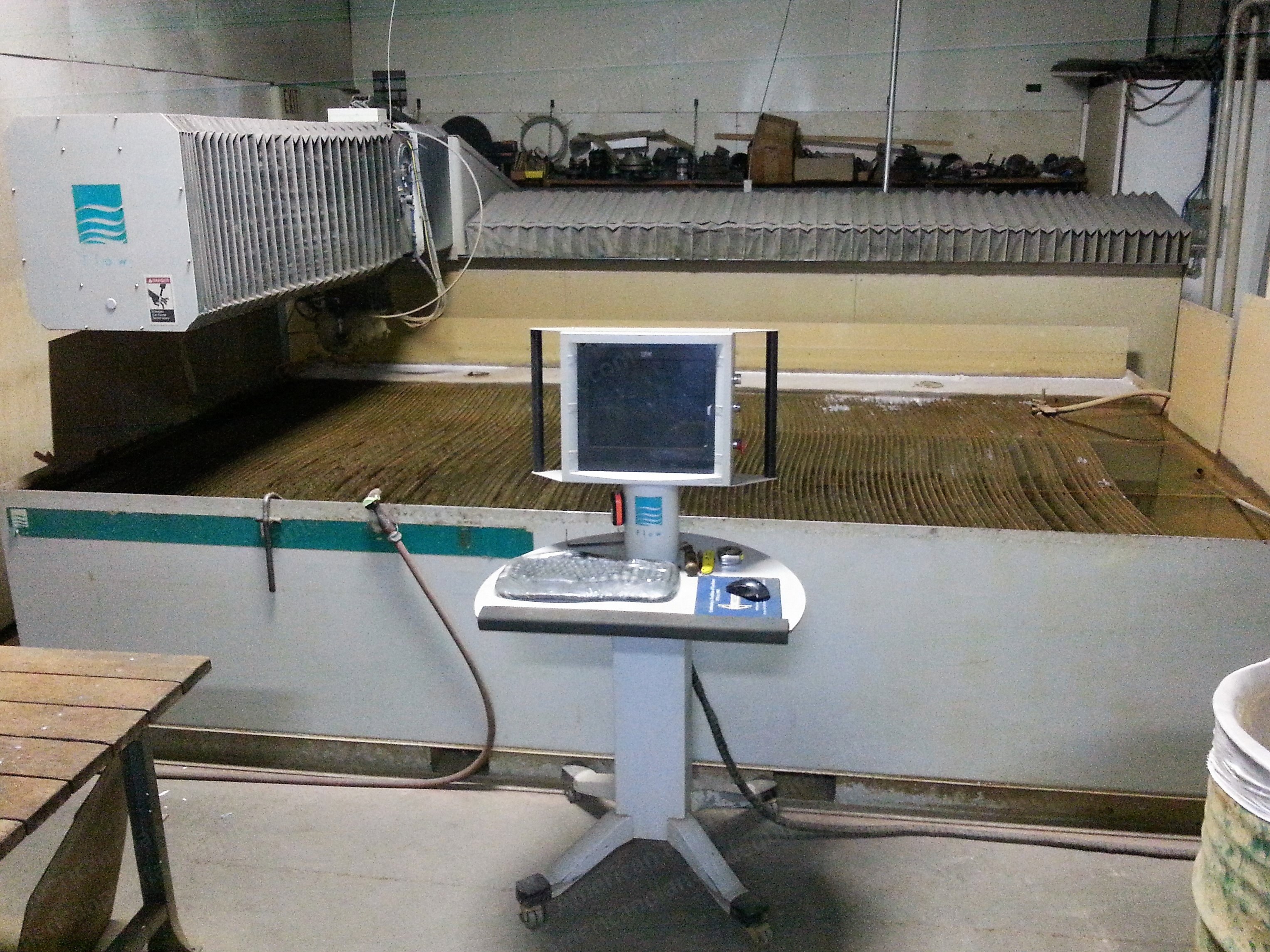 Flow, Integrated Flying Bridge, 2004, 55000 PSI, 30 HP, 6' x 12' Table, 5-Axis
