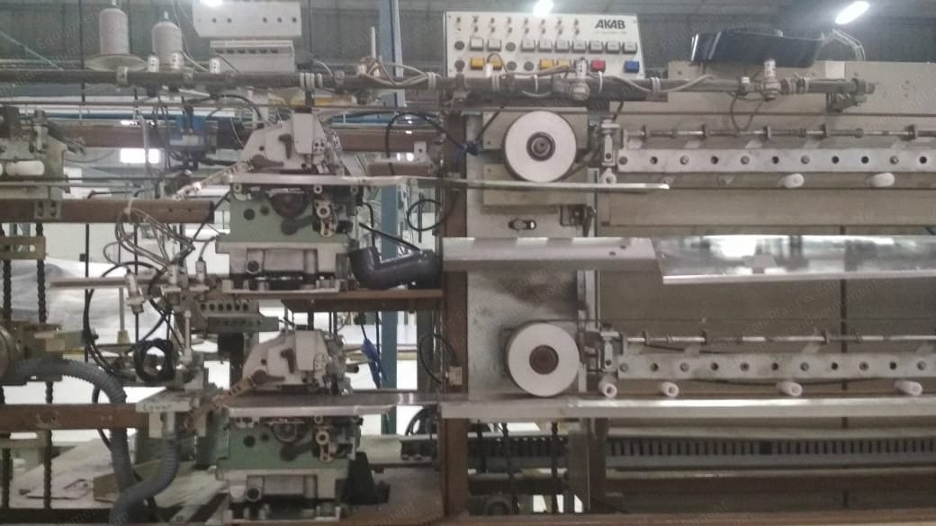 Akab, AK 256, 1998, Automatic 4 Overlocking Sewing Machine, 220V 3-Phase, Replaced PLC and HMI