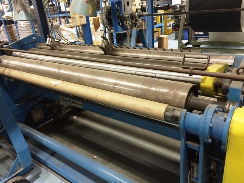 Cameron, T1010, 1999, Surface Center Rewinder, 50 Inch Rewind Diameter, Score Slitting, 500 FPM