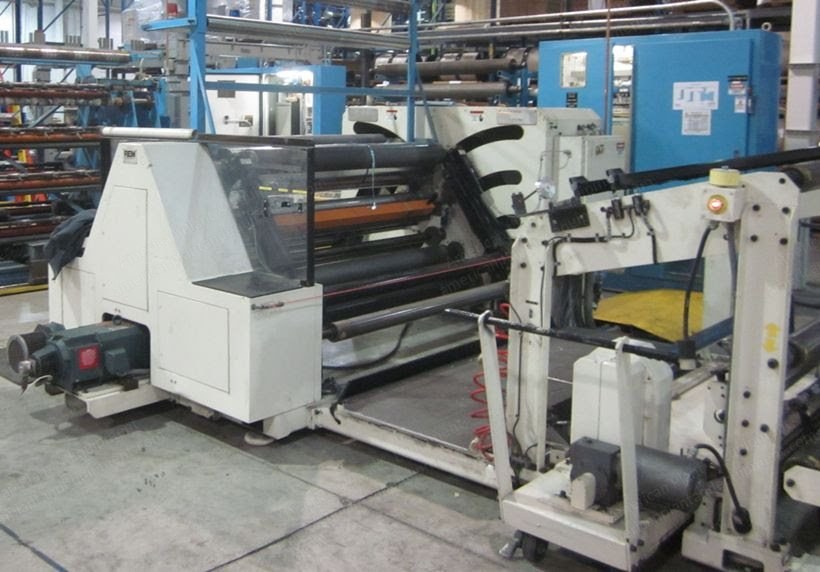 Rem, 15000, 1993, 66 Inches Width, Duplex Surface Center Slitter Rewinder